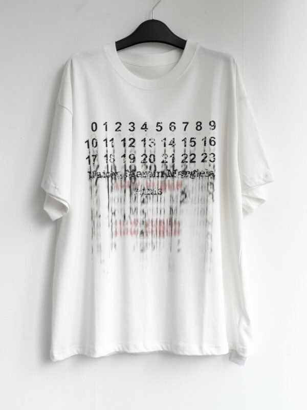 MAlSON MARGIELA x NEW VOGUE by Archive T  Shirts